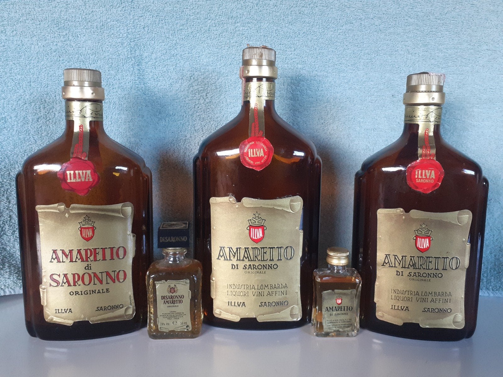 Amaretto di Saronno - 3 Grote lege Flessen & 2 Mini's, Ophalen of Verzenden, Gebruikt