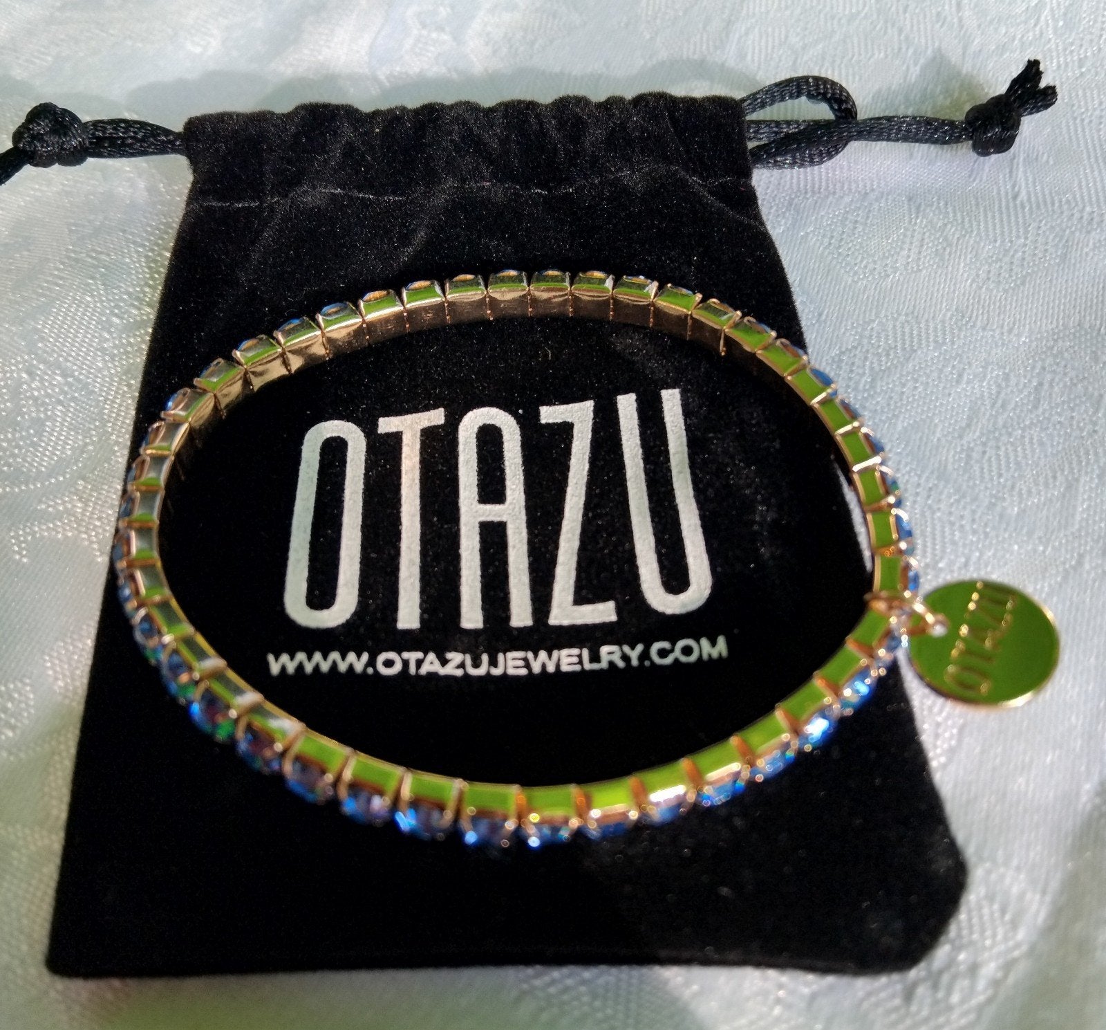 Nieuw! Otazu armband met kristallen en 24-karaat verguld, Blauw, Nieuw, Goud, Met bedels of kralen