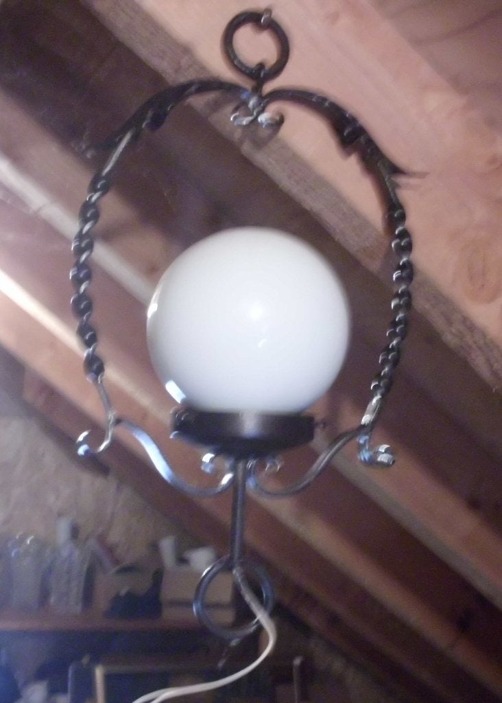 Smeedijzeren met glazen bol ., Ophalen of Verzenden