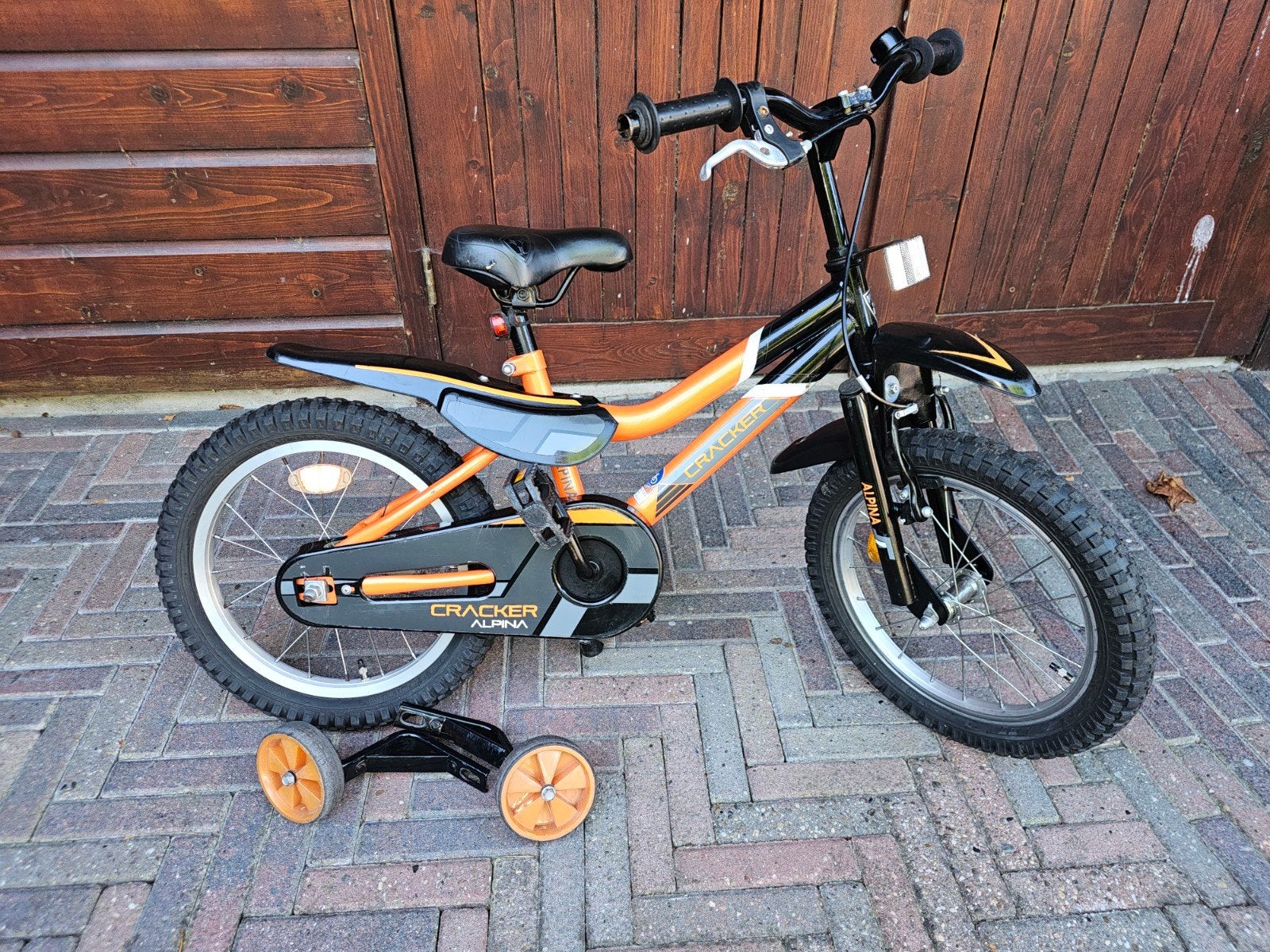 Alpina Cracker kinderfiets 16 inch met zijwieltjes, Fietsen en Brommers, Ophalen, Terugtraprem, Zijwieltjes, Alpina