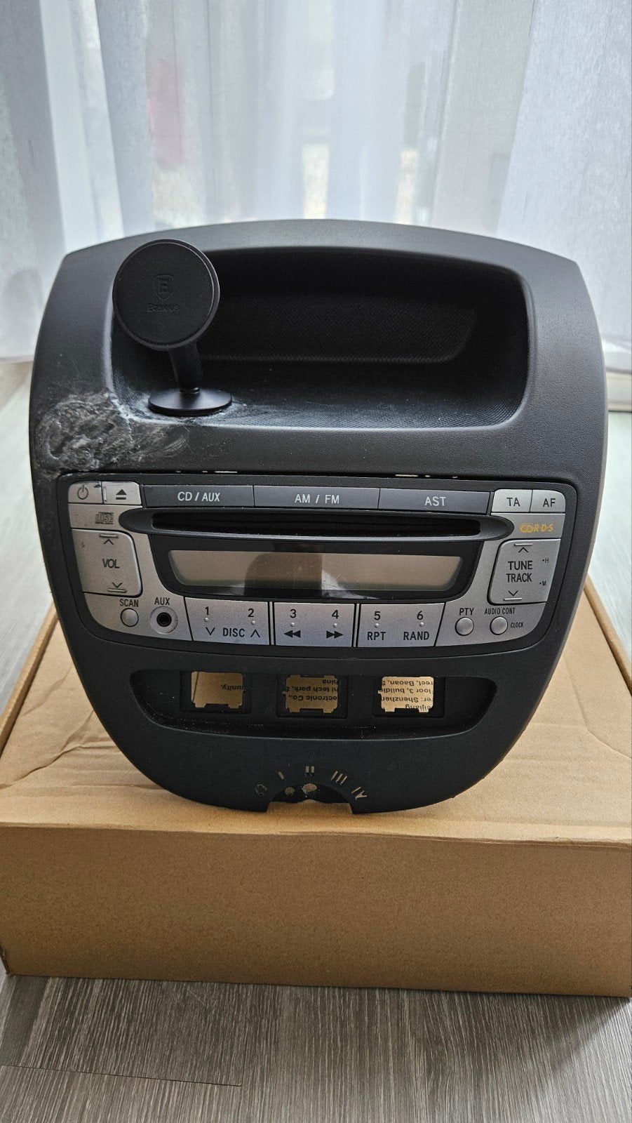 Gebruikte autoradio met CD/AUX-functie, Ophalen