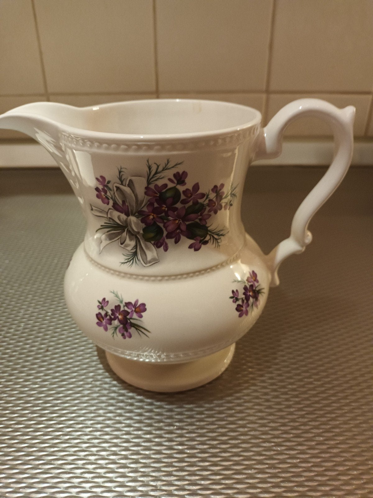 Antieke Lord Nelson Pottery waterkan met bloemmotief, Antiek en Kunst, Antiek | Keramiek en Aardewerk, Ophalen of Verzenden