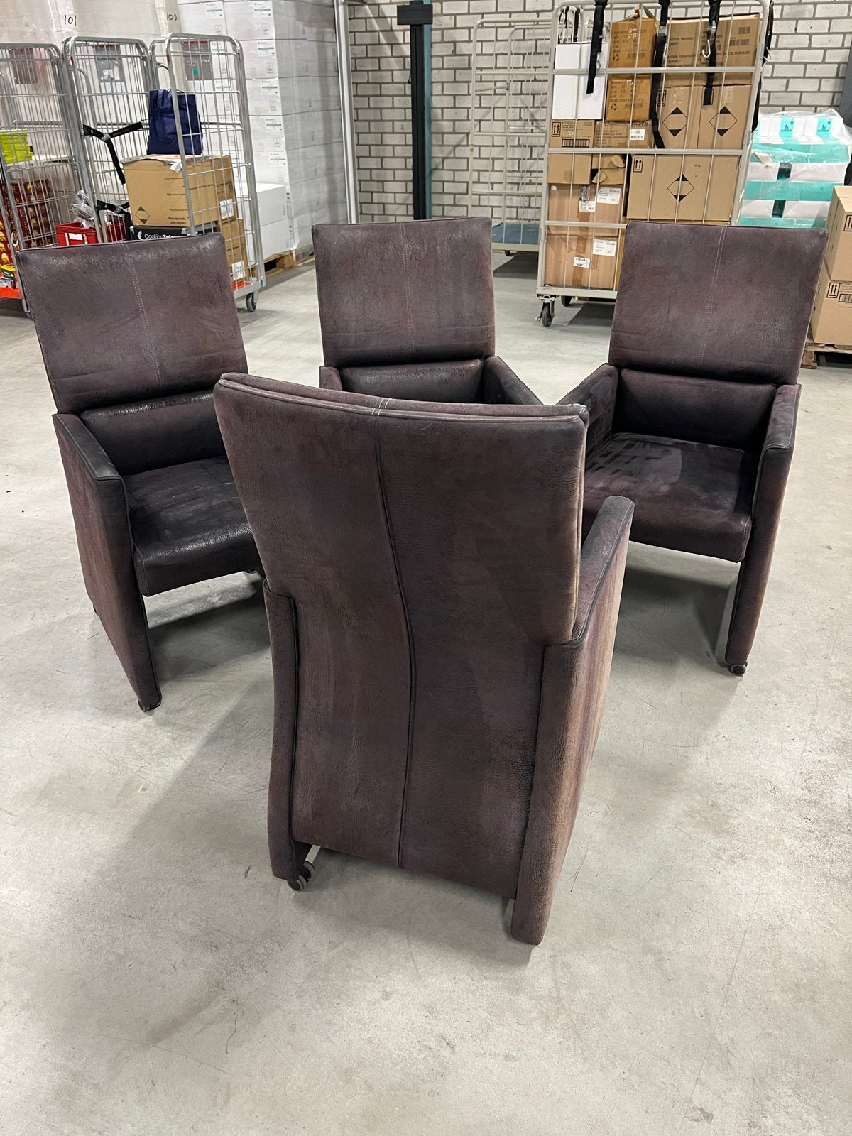 Lederen eetkamerstoelen op wielen - Set van 4, Huis en Inrichting, Stoelen, Gebruikt, Bruin, Leer, Ophalen of Verzenden