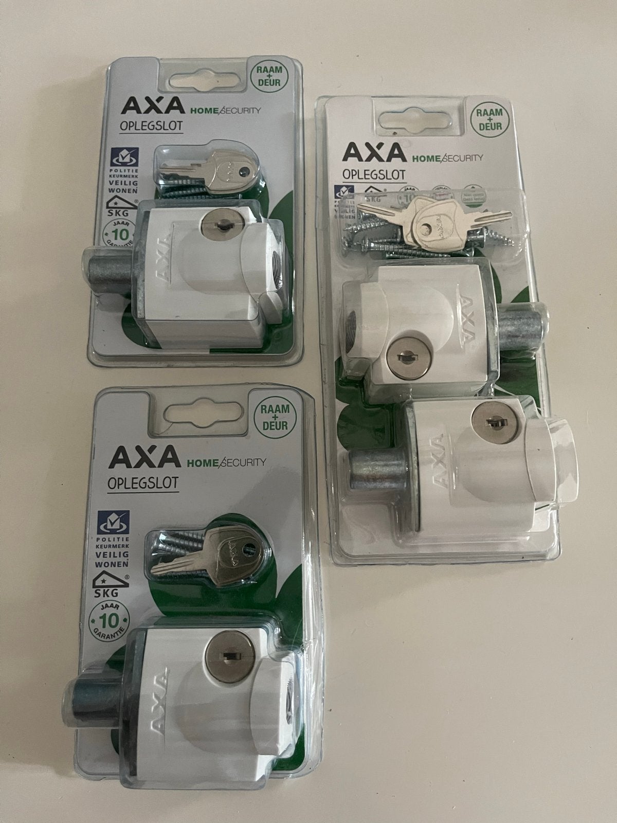 AXA Oplegslot voor Raam en Deur - Nieuw in Verpakking, Ophalen, Nieuw, Overige materialen, Slot