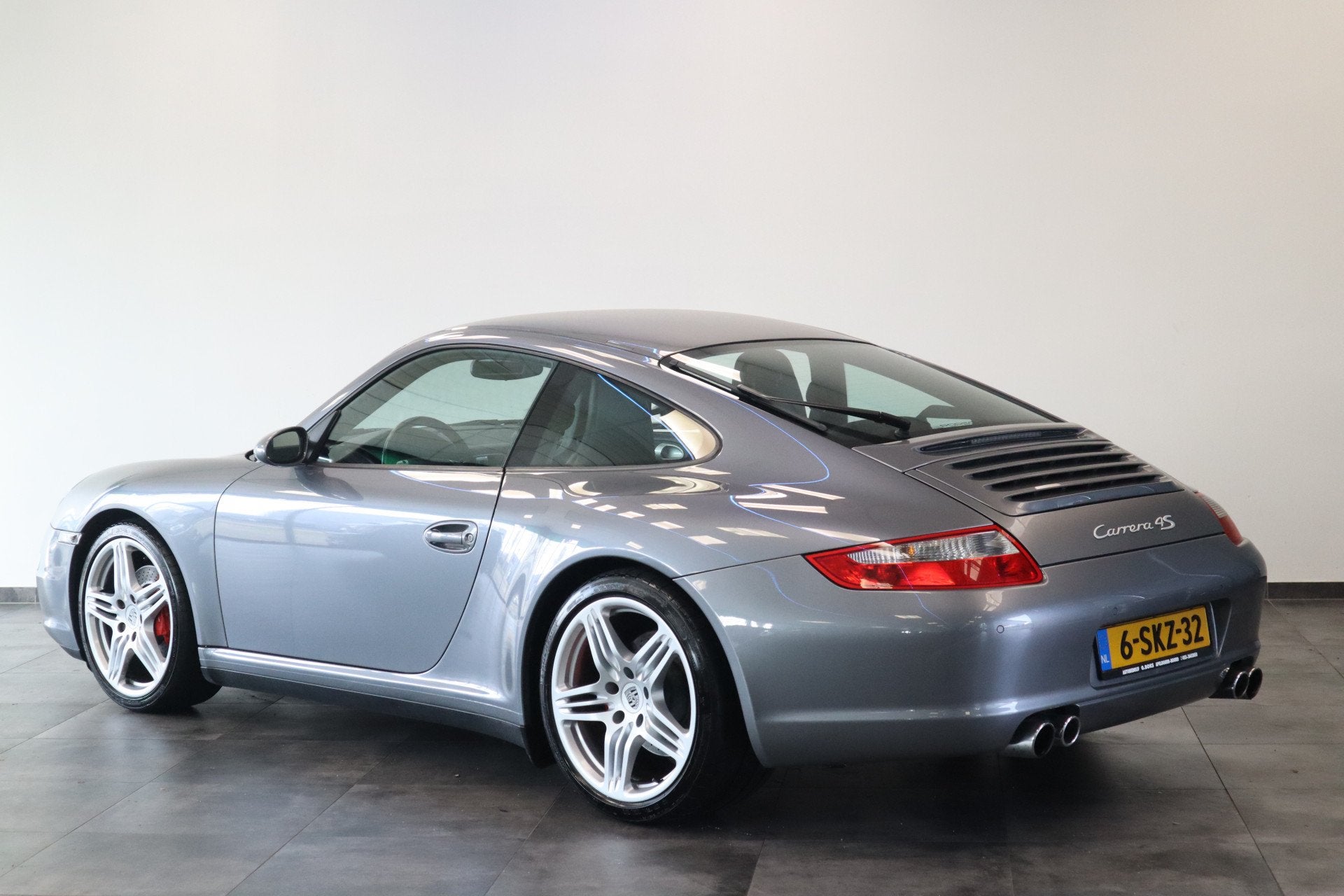 Porsche 911 3.8 Carrera 4S 355PK Navigatie 19LMV Volleder in, Automaat, 1490 kg, Gebruikt, Zwart