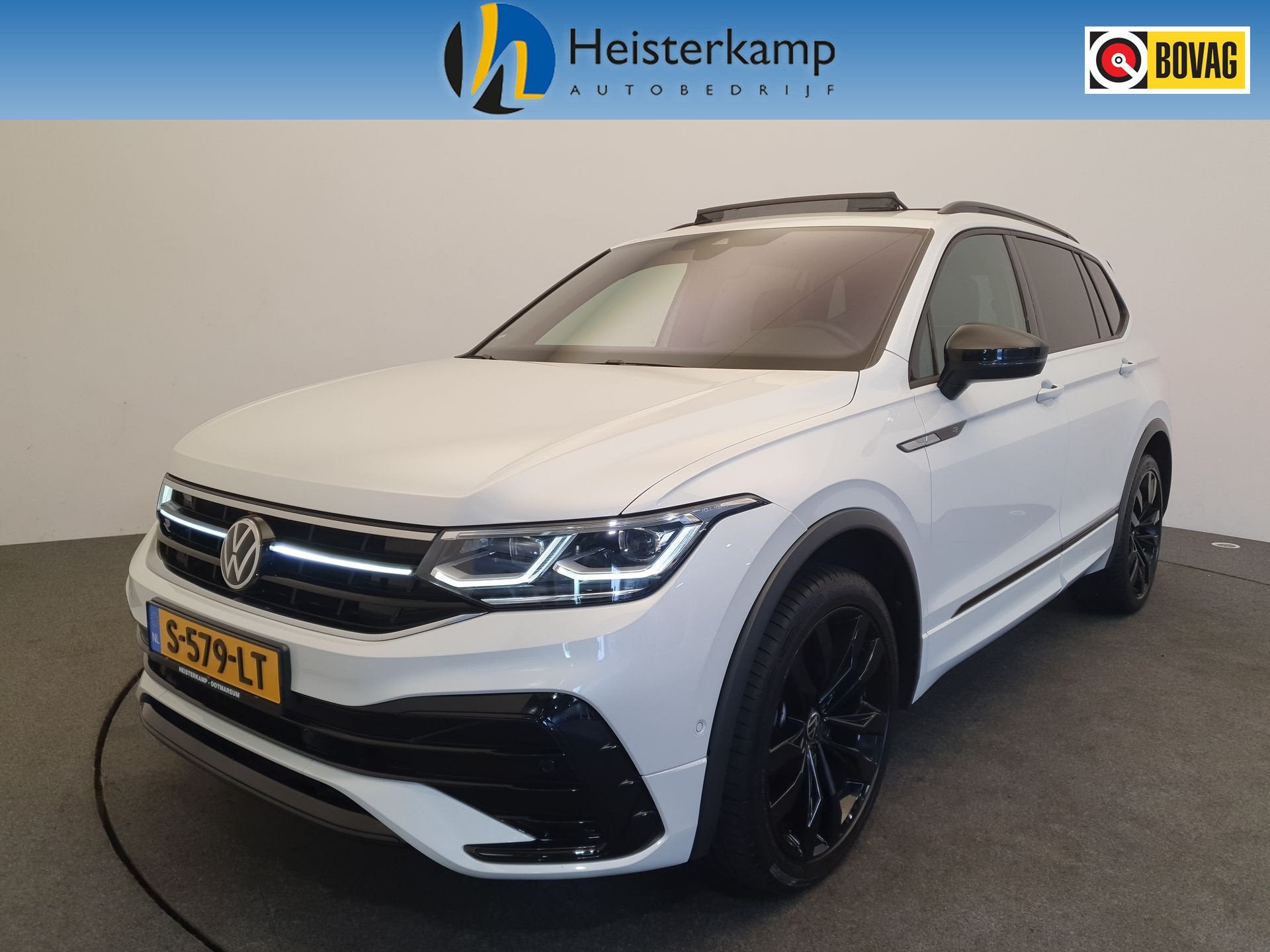 Volkswagen Tiguan Allspace 1.5 TSI R-Line Panorama dak, Trek, Auto's, Stof, Wit, Bedrijf, Verwarmde buitenspiegels