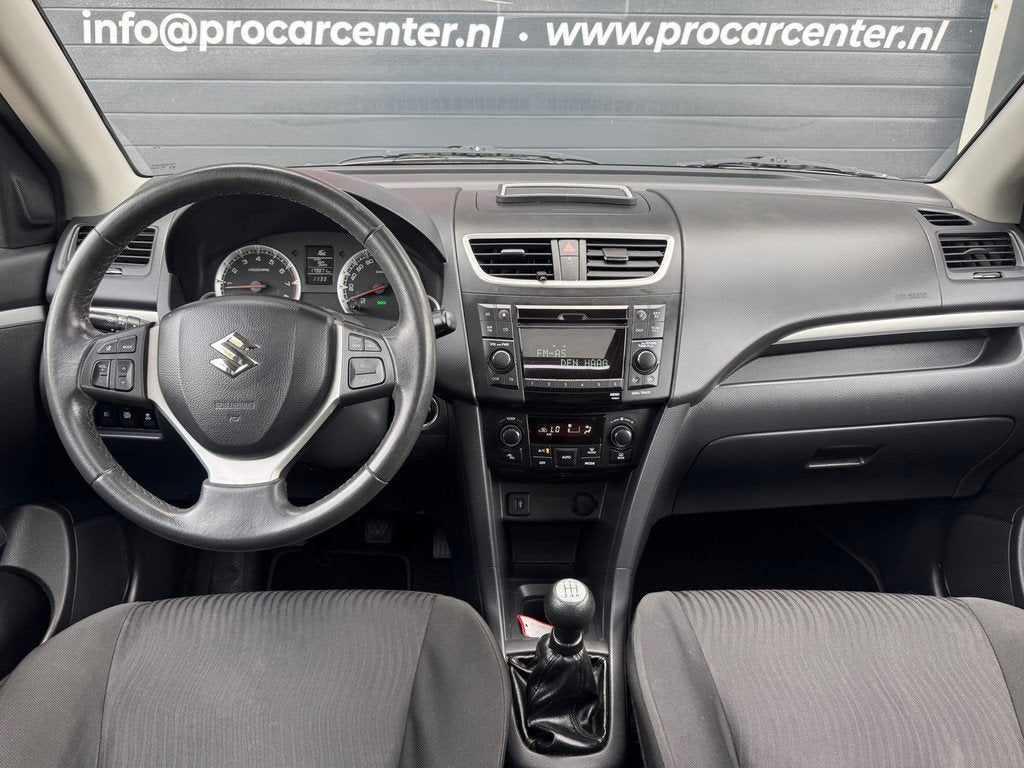 Suzuki Swift 1.2 Exclusive EASSS DAK | CLIMATE | CRUISE | ST, Voorwielaandrijving, Stof, Gebruikt, 4 cilinders