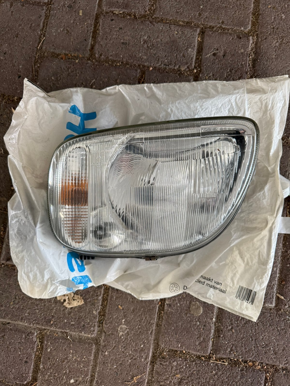 Nissan micra k11 koplamp, Ophalen of Verzenden, Nissan