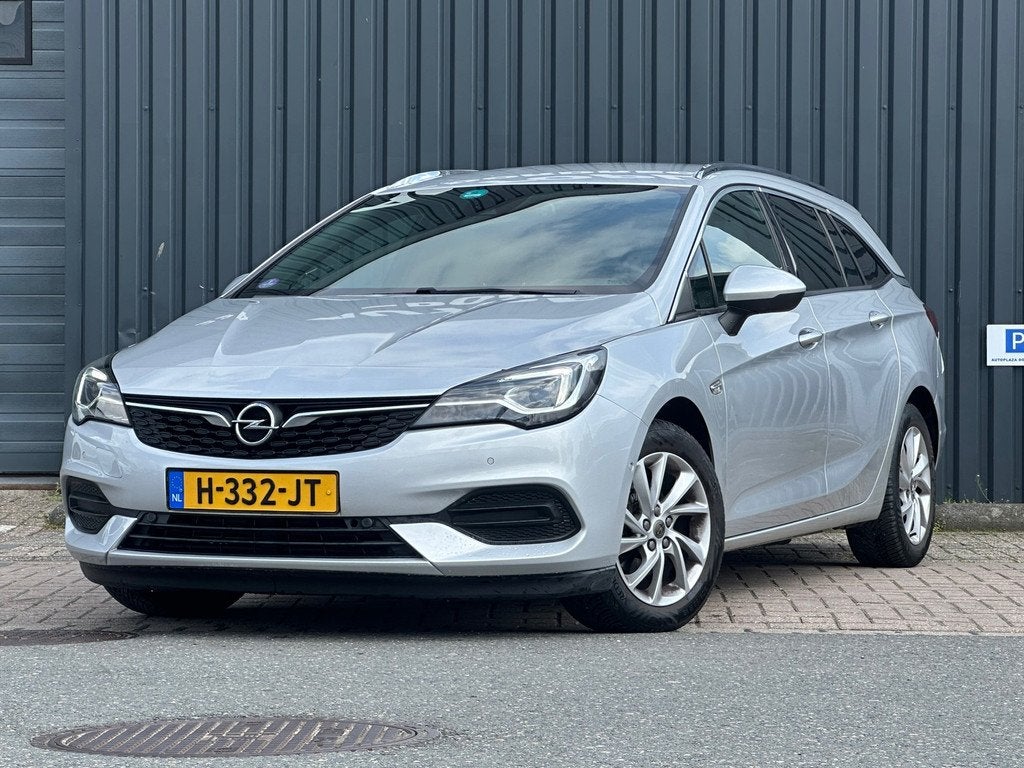 Opel Astra Sports Tourer 1.2 Elegance|TREKHAAK|CAMERA|, Voorwielaandrijving, Stof, Gebruikt, 1199 cc