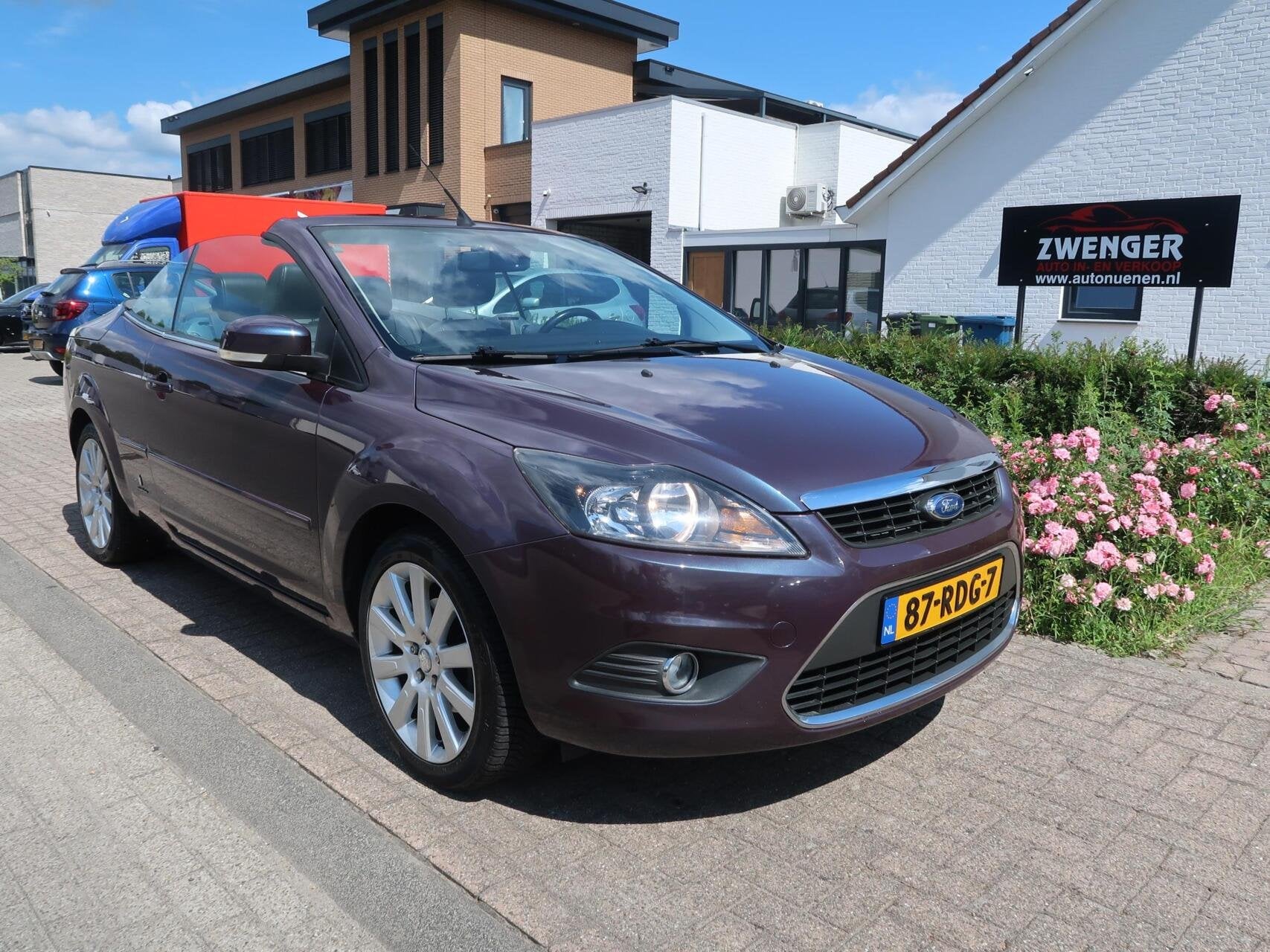 Ford Focus Cabriolet 1.6 NAVIGATIE|CARPLAY|LEDER|CRUISECONTR, Auto's, Gebruikt, Zwart, 4 cilinders, Cabriolet