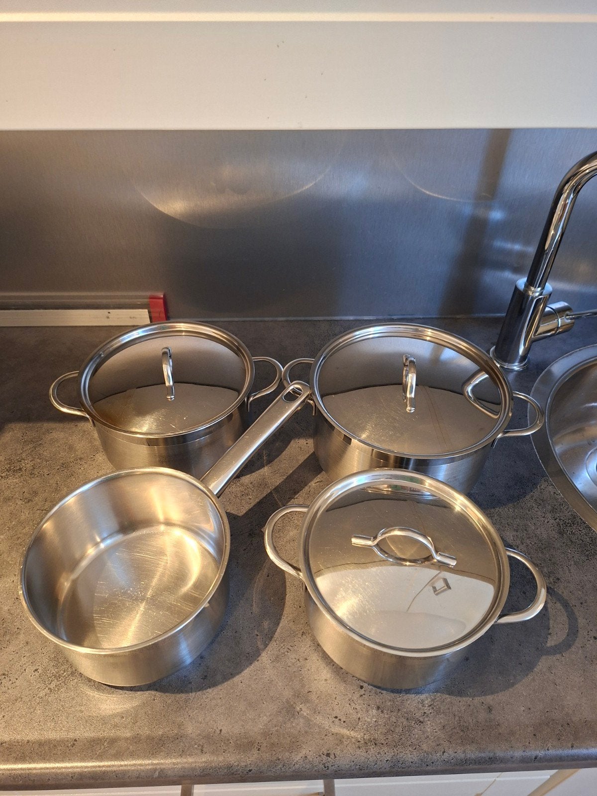 Pannenset RVS - 4 stuks met deksels, Huis en Inrichting, Keuken | Potten en Pannen, Gebruikt, Pannenset, Ophalen of Verzenden