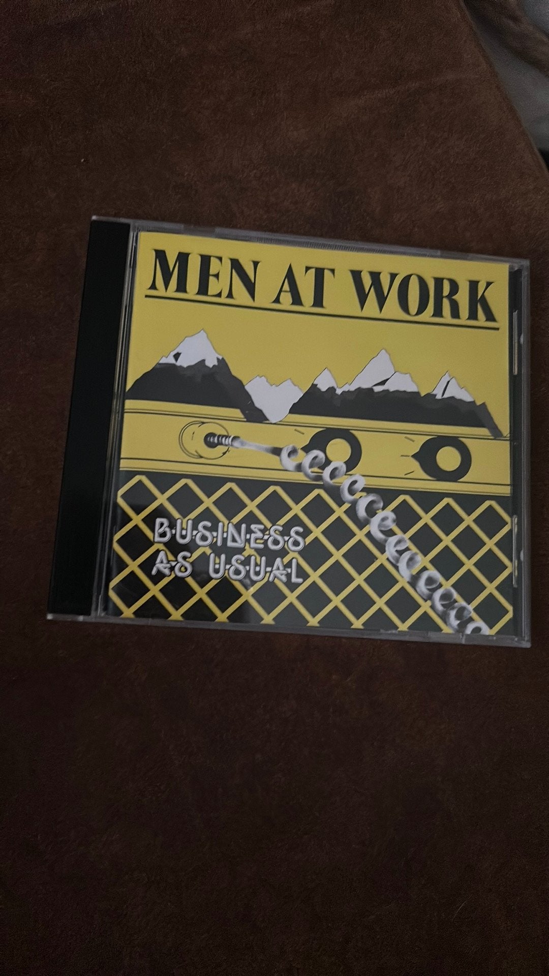 Men at work - business as usual, Ophalen of Verzenden, Zo goed als nieuw, Poprock