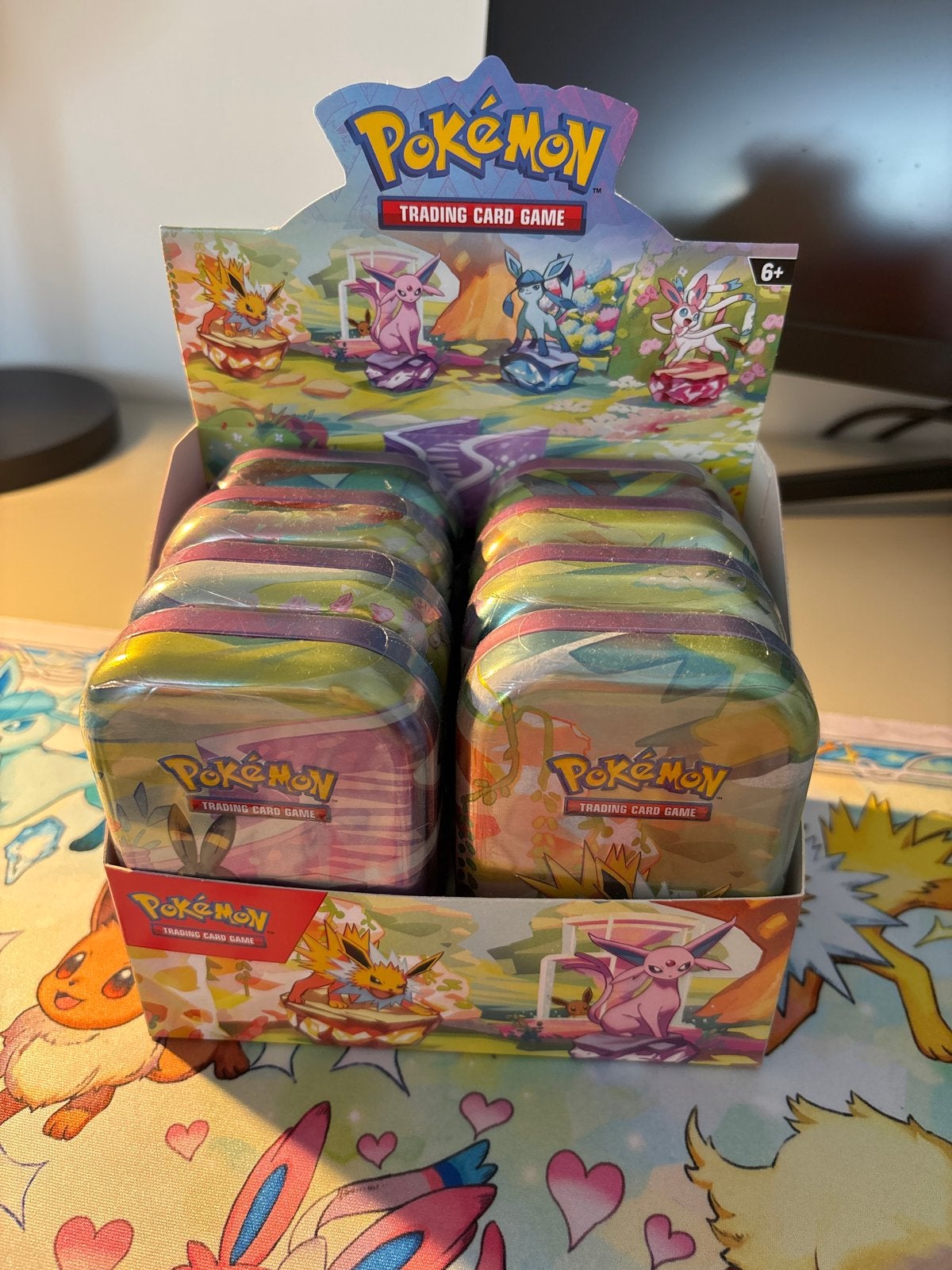 Prismatic evolution Mini Tin Display, Ophalen, Nieuw, Booster