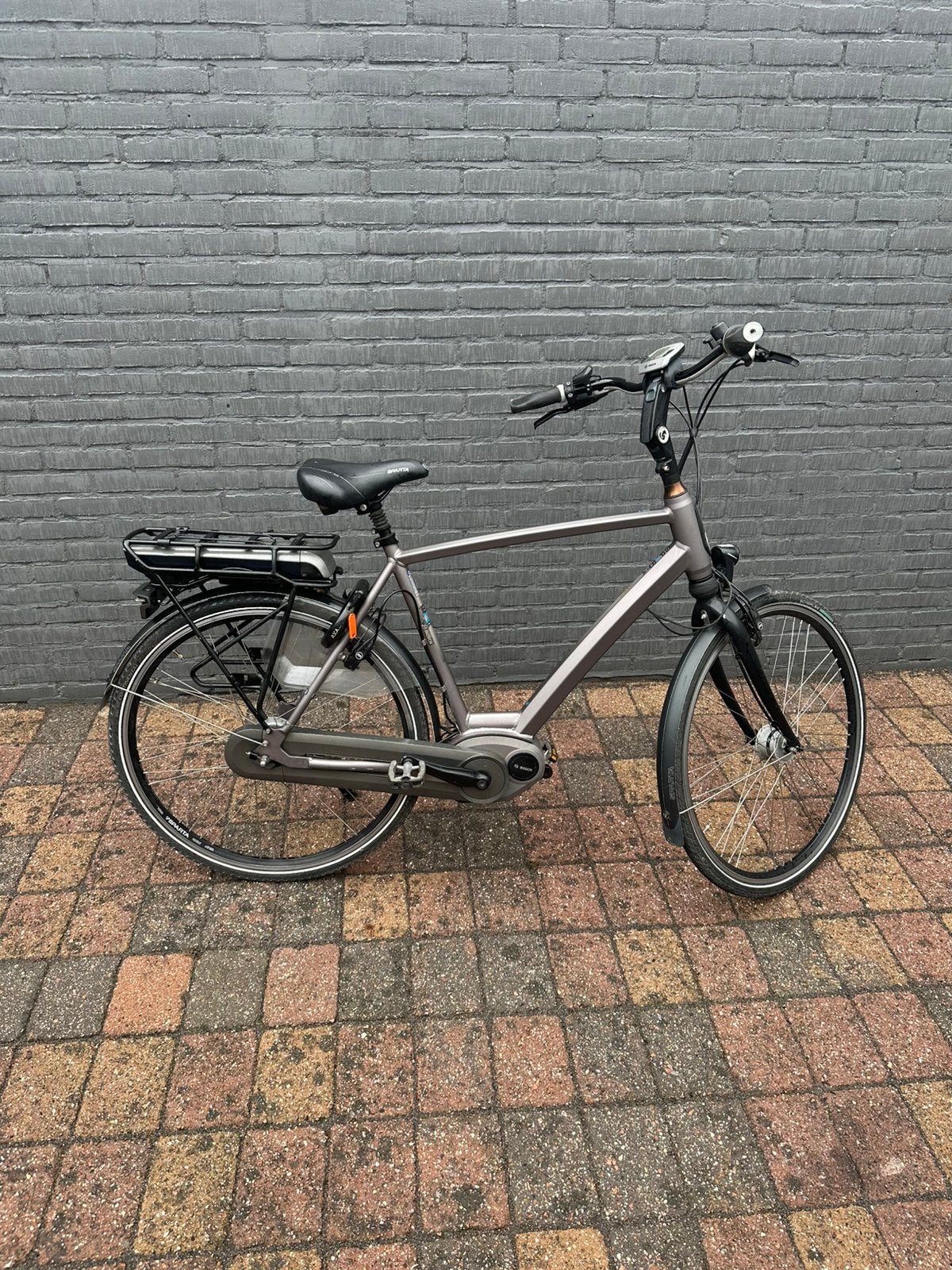 Sparta elektrische fiets met Bosch middenmotor, Fietsen en Brommers, Elektrische fietsen, Ophalen, Sparta, Zo goed als nieuw, 50 km per accu of meer