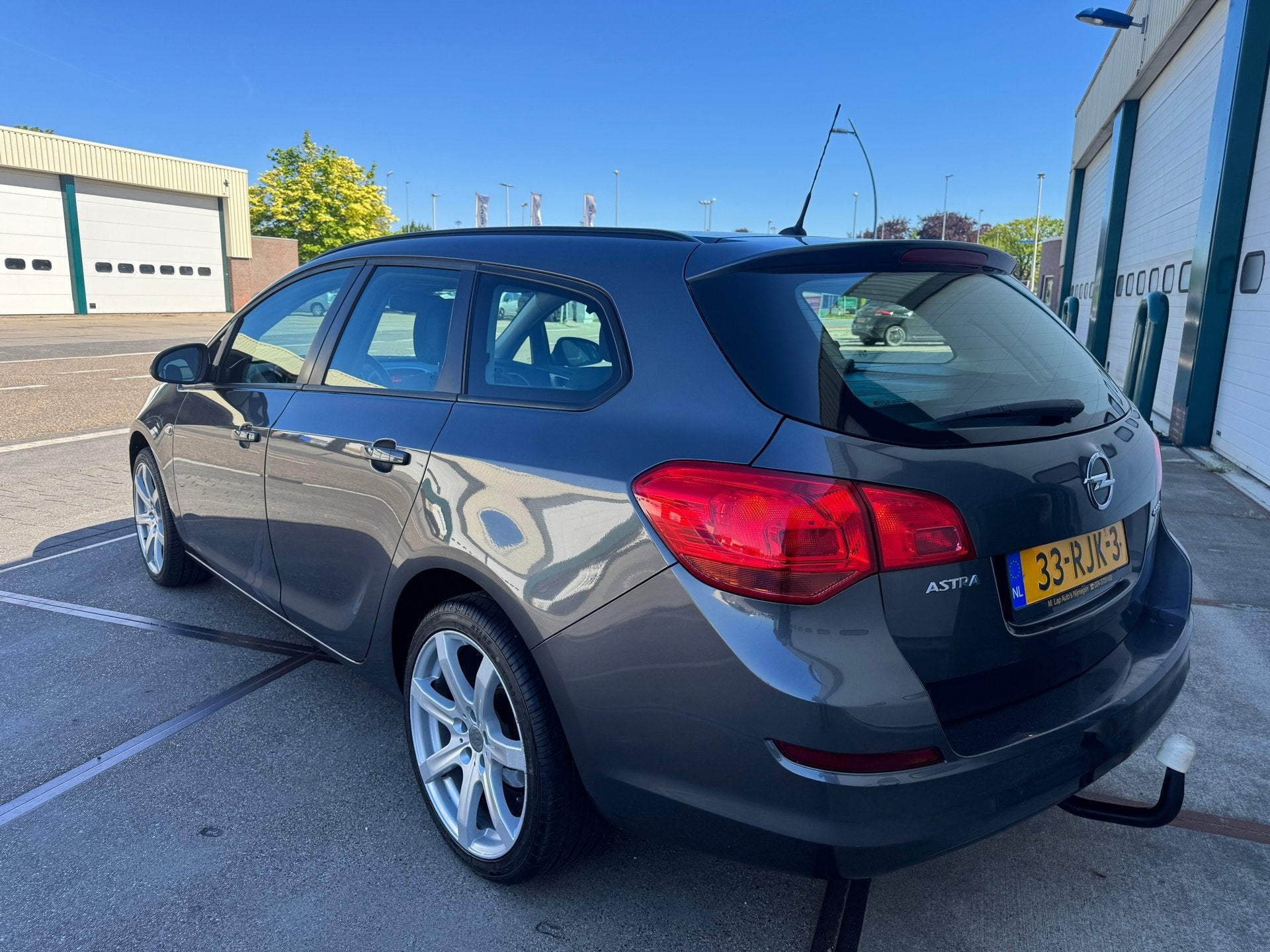 Opel Astra Sports Tourer 1.4 Edition, Auto's, Opel, Voorwielaandrijving, Euro 5, 4 cilinders, Origineel Nederlands