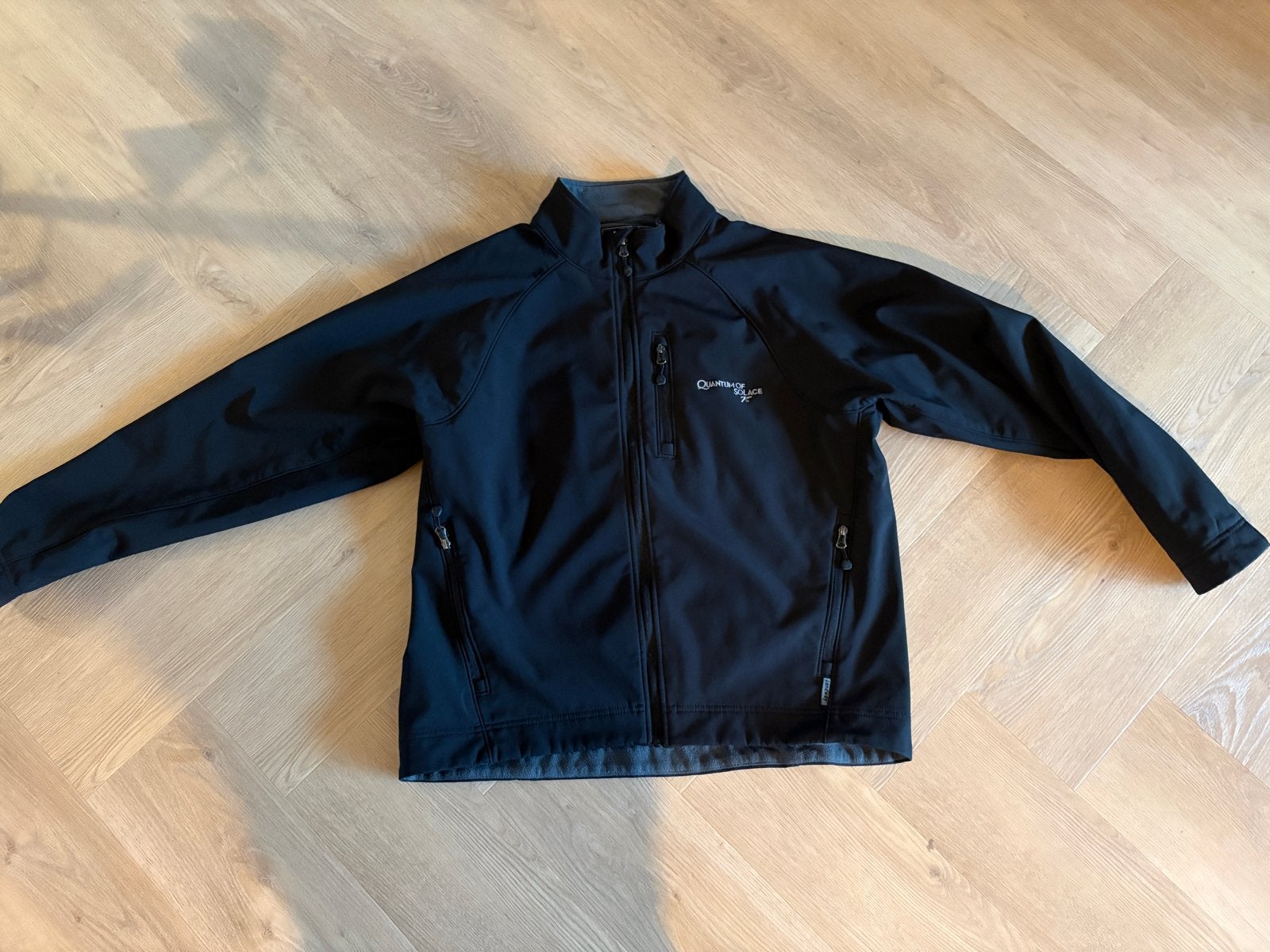 Soft-Shell Jas 'Quantum of Solace' - Maat L, Ophalen of Verzenden, Zo goed als nieuw, Maat 52/54 (L), Zwart