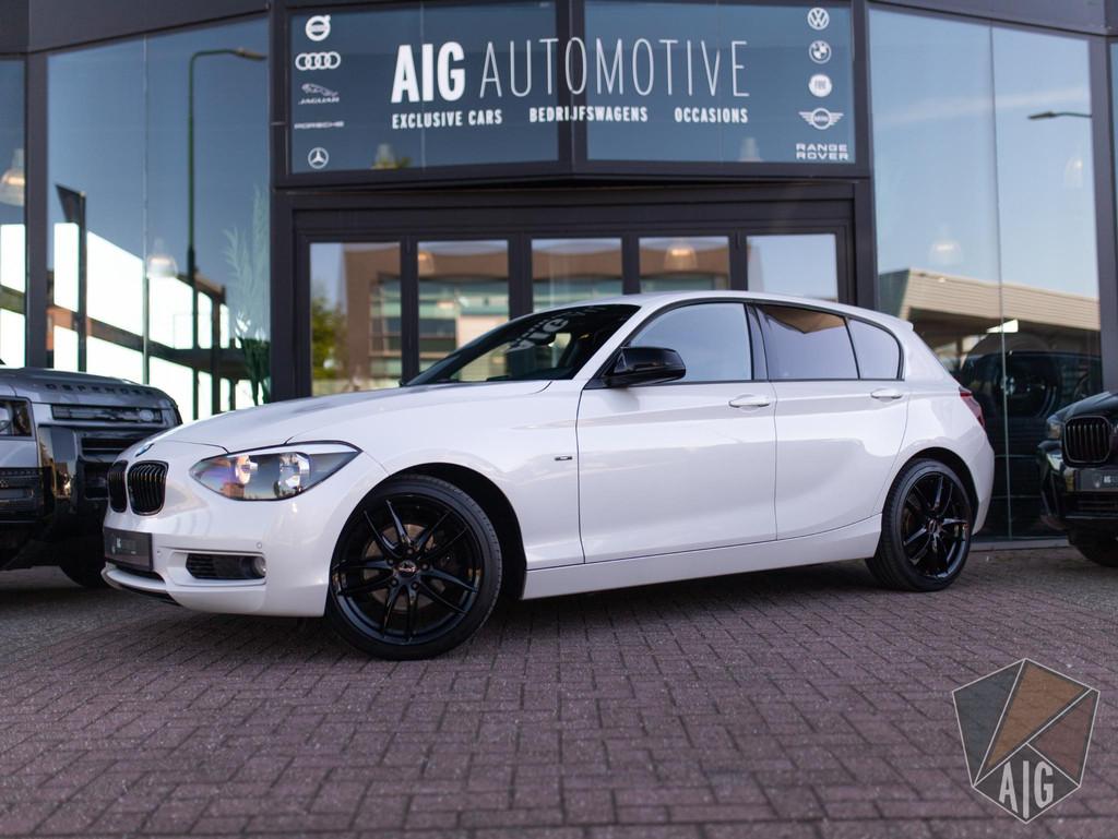 BMW 1-serie 118i | Urban | Stoelverw. | Bluetooth | PDC, Achterwielaandrijving, Gebruikt, Euro 6, 4 cilinders