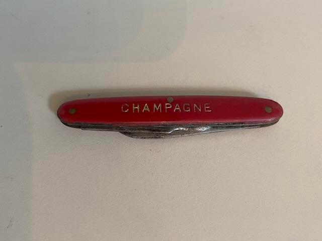Vintage klein rood champagne zakmesje. Trouillard & Cie., Ophalen