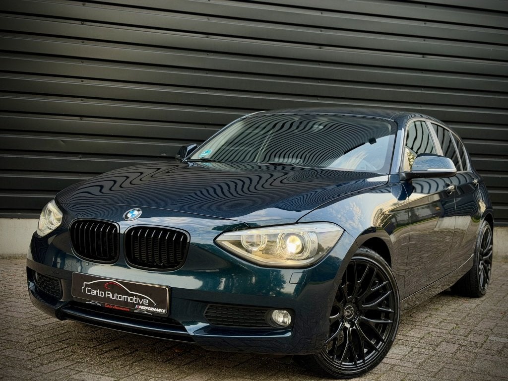 Bmw 1-serie 116i Executive AUT|CLIMA|XENON|NAVI|PDC, Dealer onderhouden, Gebruikt, 4 cilinders, Blauw