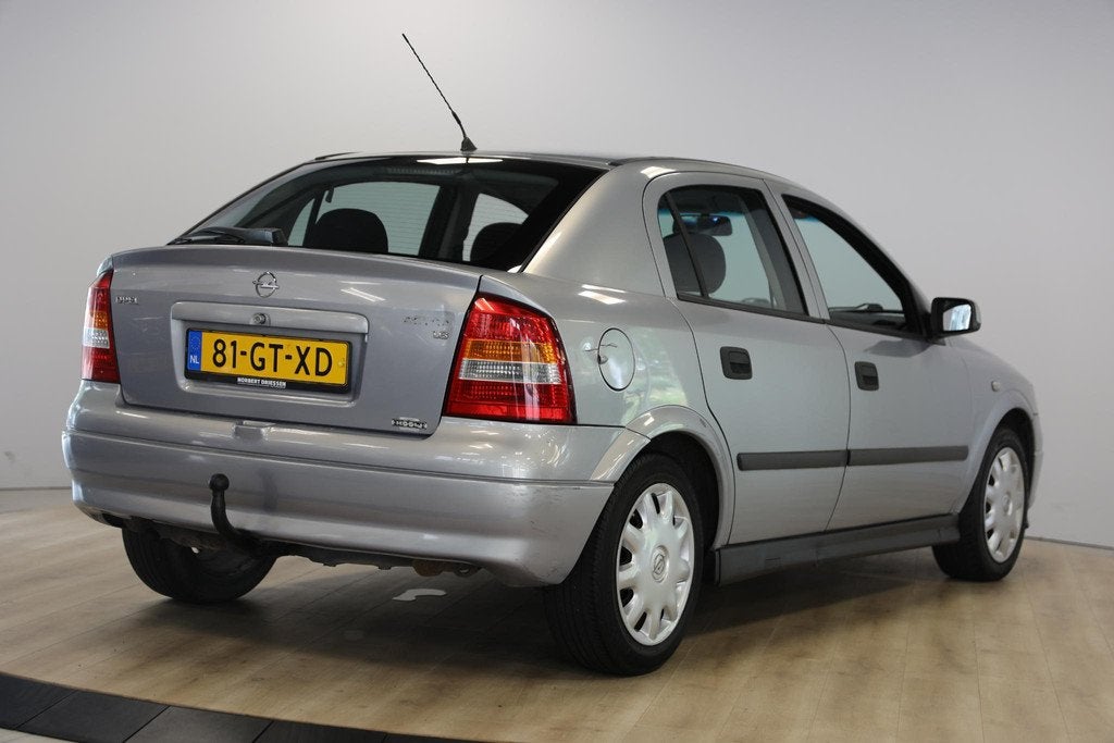Opel Astra 1.6 Pearl | Airco | Trekhaak | APK tot 04-2027, Auto's, Voorwielaandrijving, 1063 kg, Gebruikt, Zwart