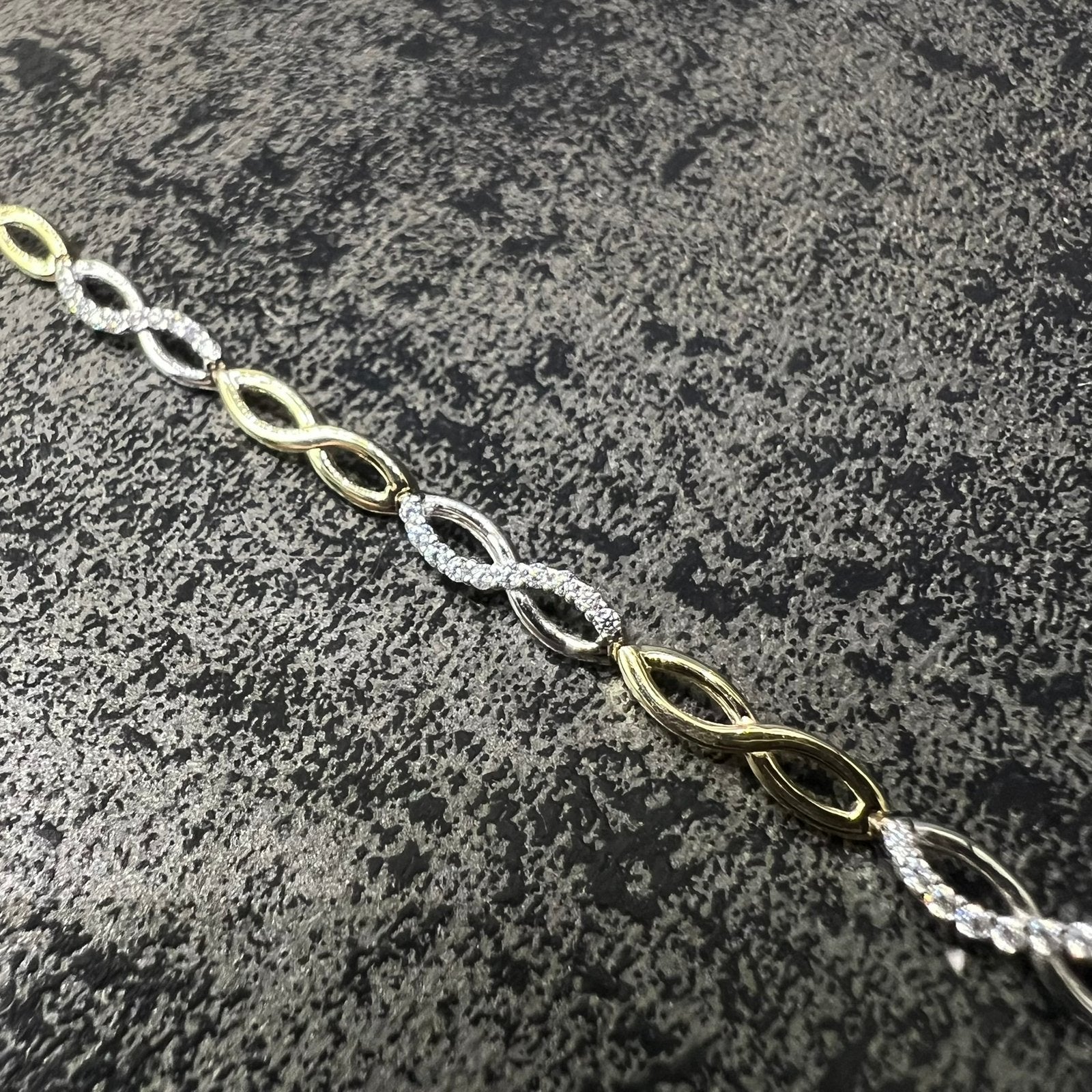 14k gouden armband infinity schakel, Ophalen of Verzenden, Zo goed als nieuw, Goud