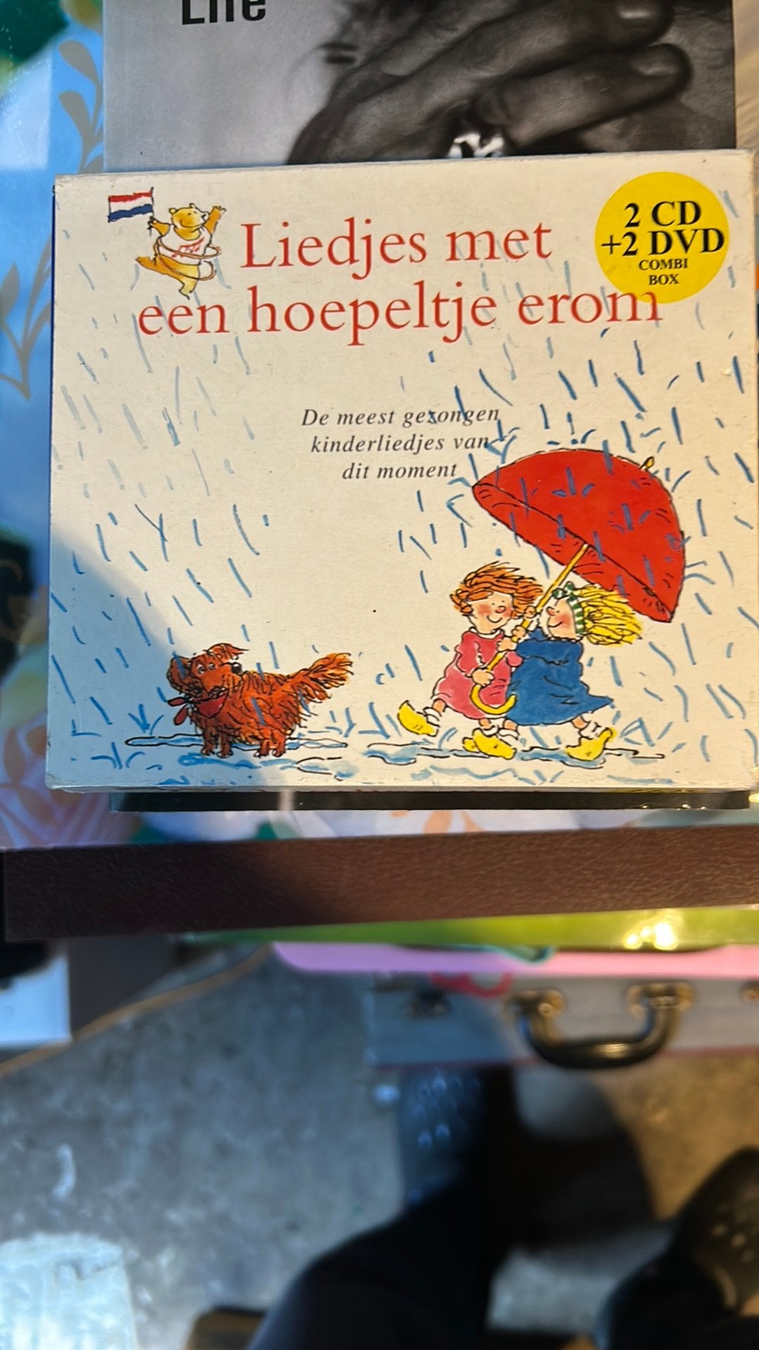 Liedjes met een hoepeltje erom, Ophalen of Verzenden, Zo goed als nieuw
