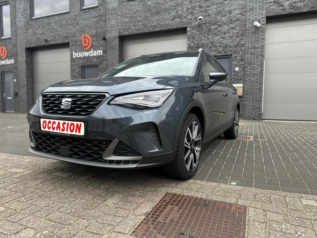 Seat Arona 1.0 TSI 110pk Dsg-7 2023 Grijs/ Fabrieksgarantie!, Auto's, 610 kg, Bedrijf, Lichtsensor, 1100 kg