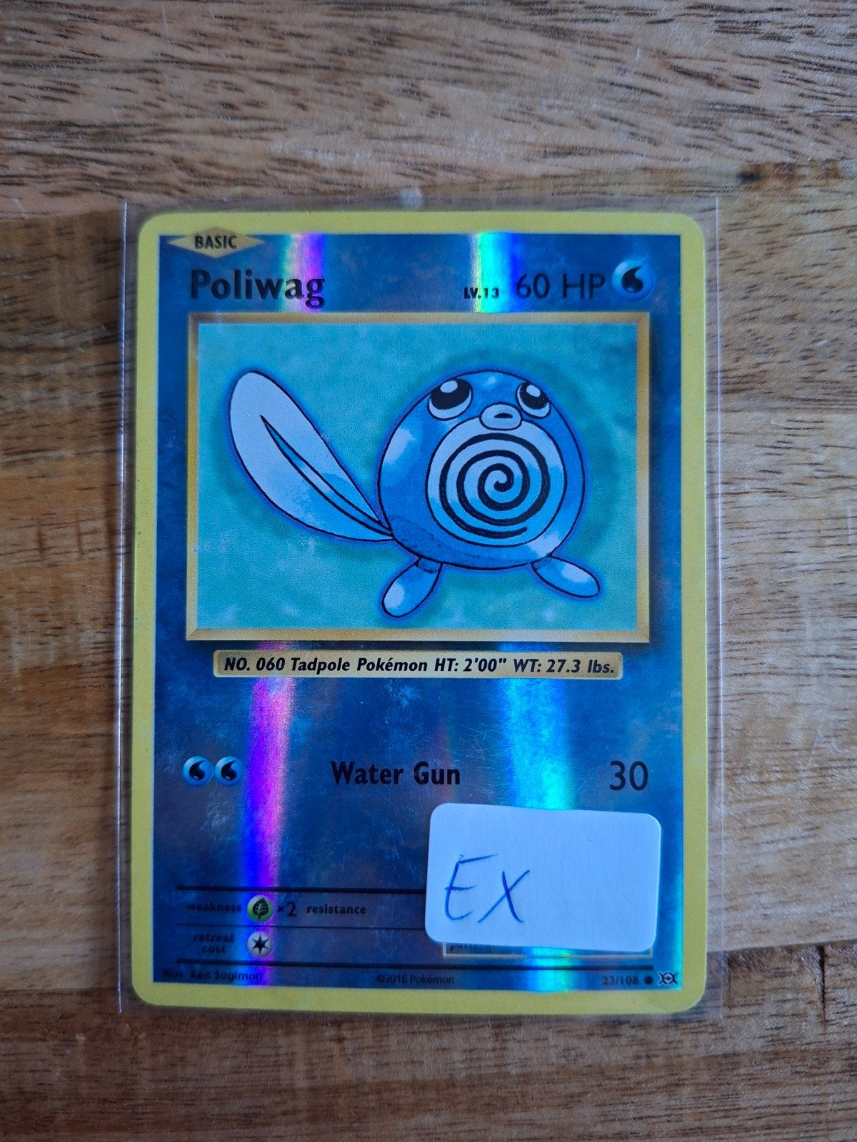Poliwag reverse holo - Evolutions, Ophalen of Verzenden, Zo goed als nieuw, Losse kaart, Foil