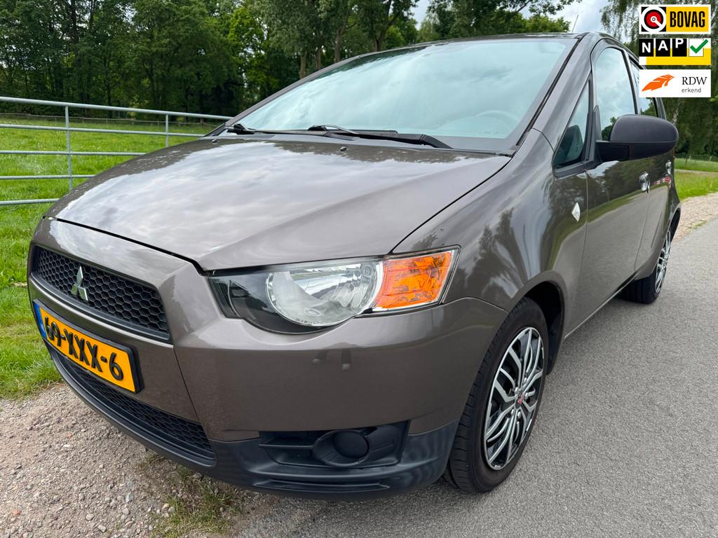 Mitsubishi Colt 1.1 Edition One top onderhouden, Euro 5, Stof, Gebruikt, Metallic lak