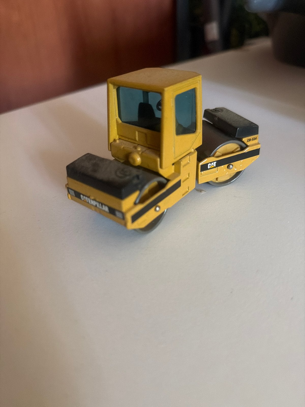 Caterpillar CB-534 Wegenwals Speelgoedmodel, Ophalen of Verzenden, Zo goed als nieuw