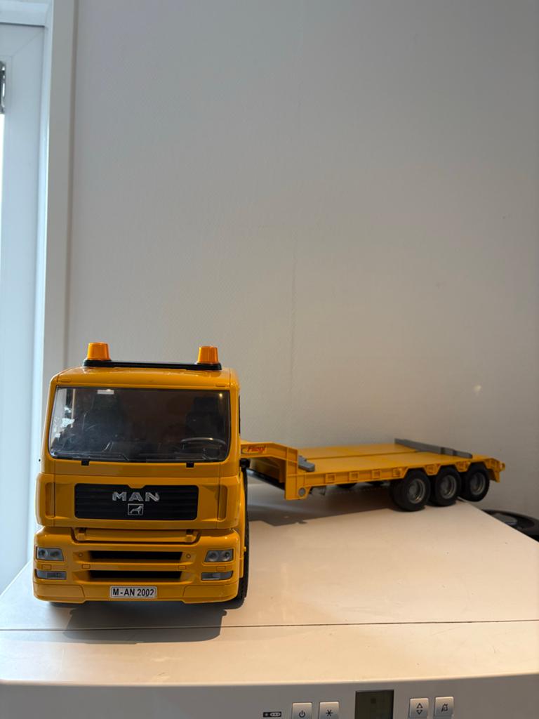 Bruder MAN Vrachtwagen met Fliegl Dieplader, Ophalen of Verzenden, Gebruikt