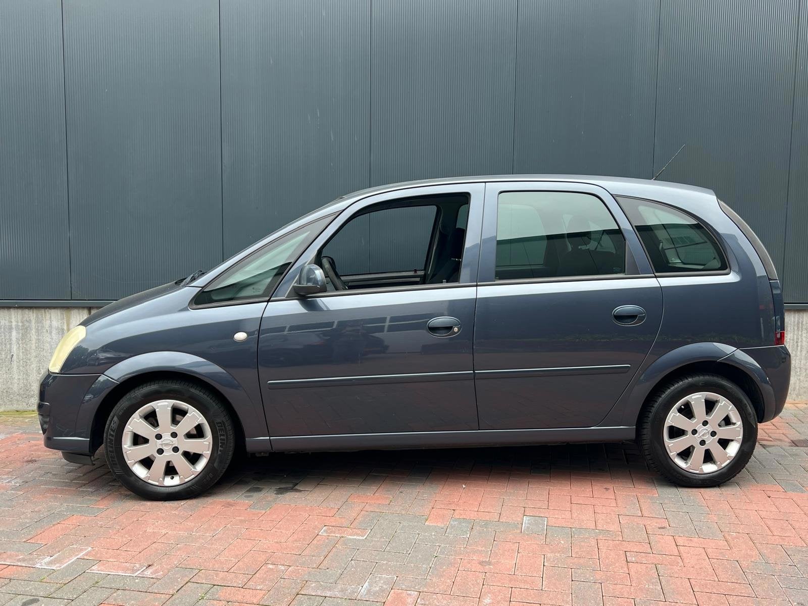 Opel Meriva 1.4-16V Temptation * Cruise * Airco * Elek-ramen, Voorwielaandrijving, Stof, Gebruikt, Zwart