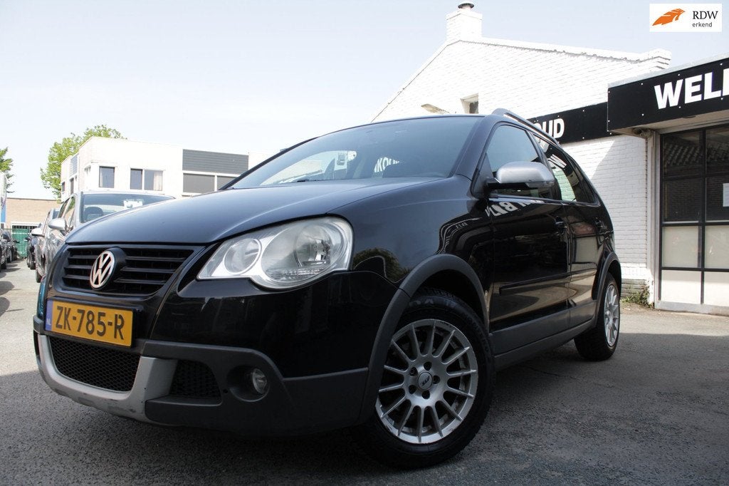 Volkswagen Polo 1.4-16V Comfortline Cross | Airco | Elec ram, Voorwielaandrijving, Gebruikt, Zwart, Stoelverwarming