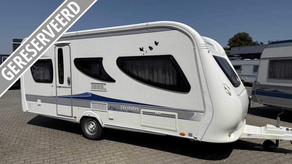 Hobby La Vita Bionda 495 UL bouwjaar 2009 met voortent, Caravans en Kamperen, Caravans, Schokbreker, Rondzit, Hobby, Bedrijf