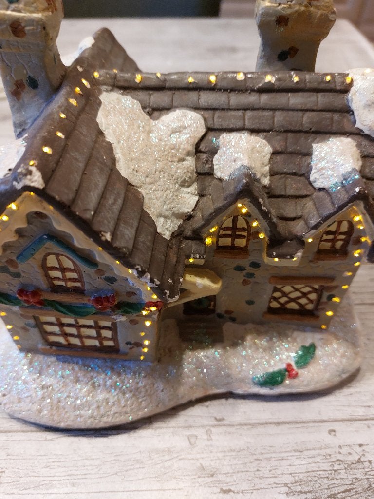Kerst huisje met verlichting, Ophalen