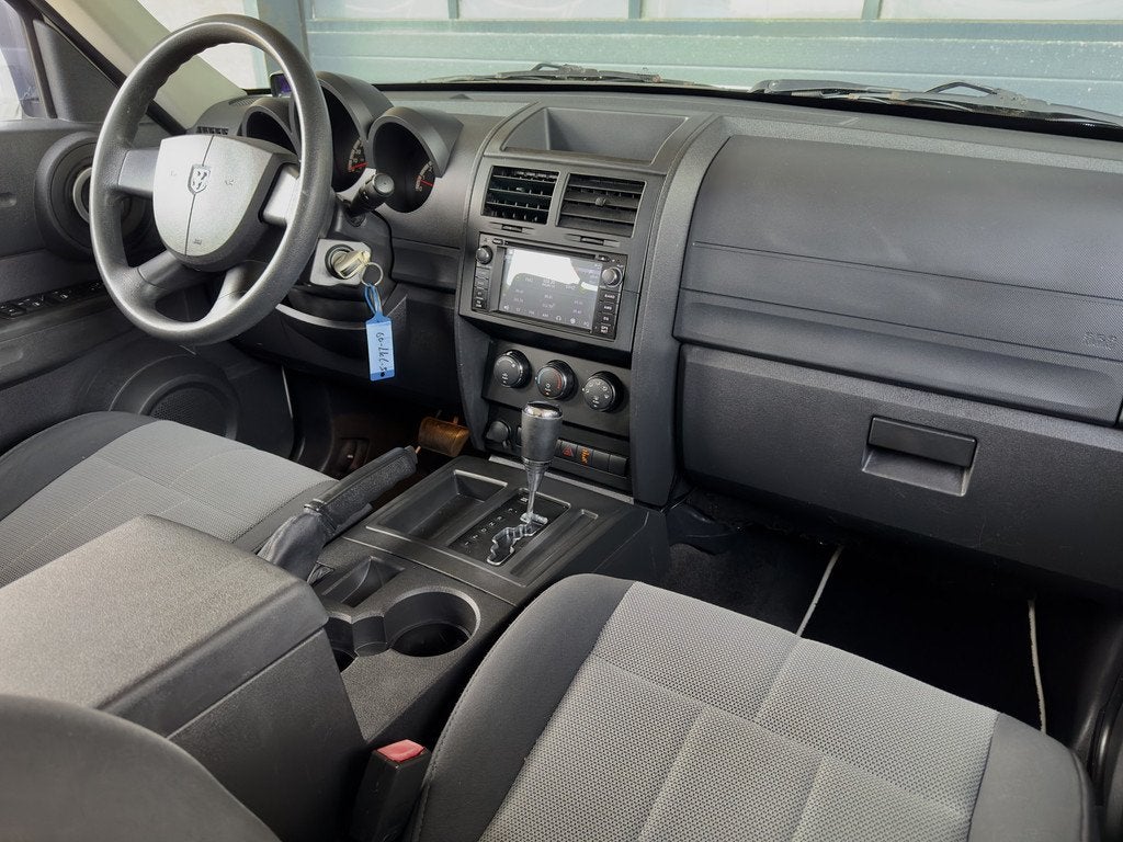 Dodge Nitro 3.7 V6 AUT4 SE NAVI AIRCO LED LMV PDC (bj 2008), Auto's, Dodge, Automaat, Gebruikt, 2500 kg, Wit