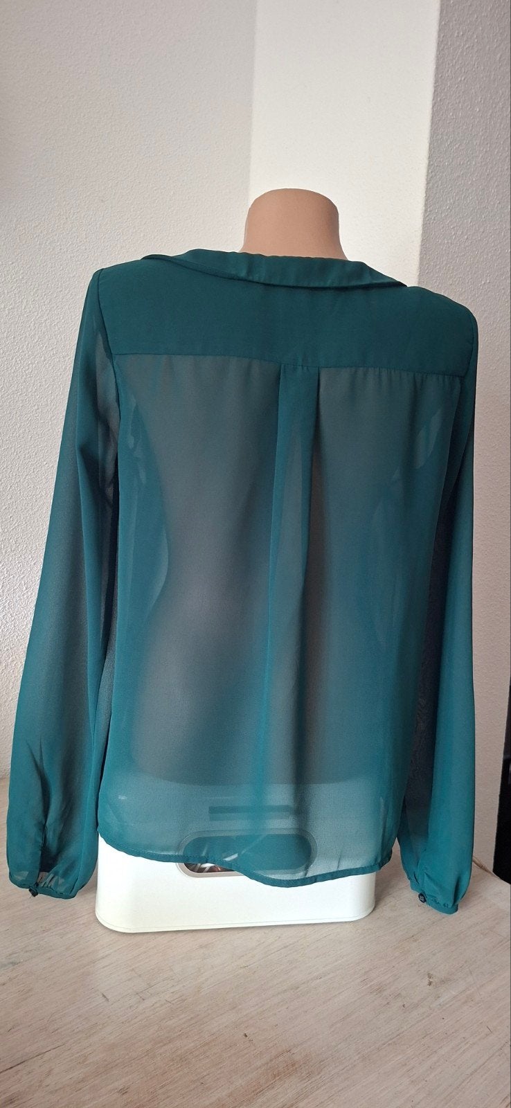 Groene transparante blouse Vila maat S
Aparte kraag en reve, Vila, Ophalen of Verzenden, Zo goed als nieuw, Maat 36 (S)
