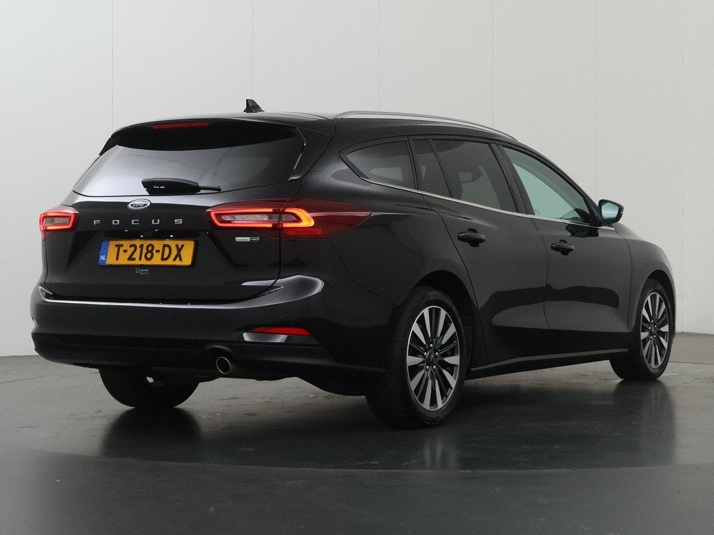Ford Focus Wagon 1.0 EcoBoost Hybrid Titanium X | Winterpakk, Auto's, Gebruikt, Zwart, Handgeschakeld, 19 km/l