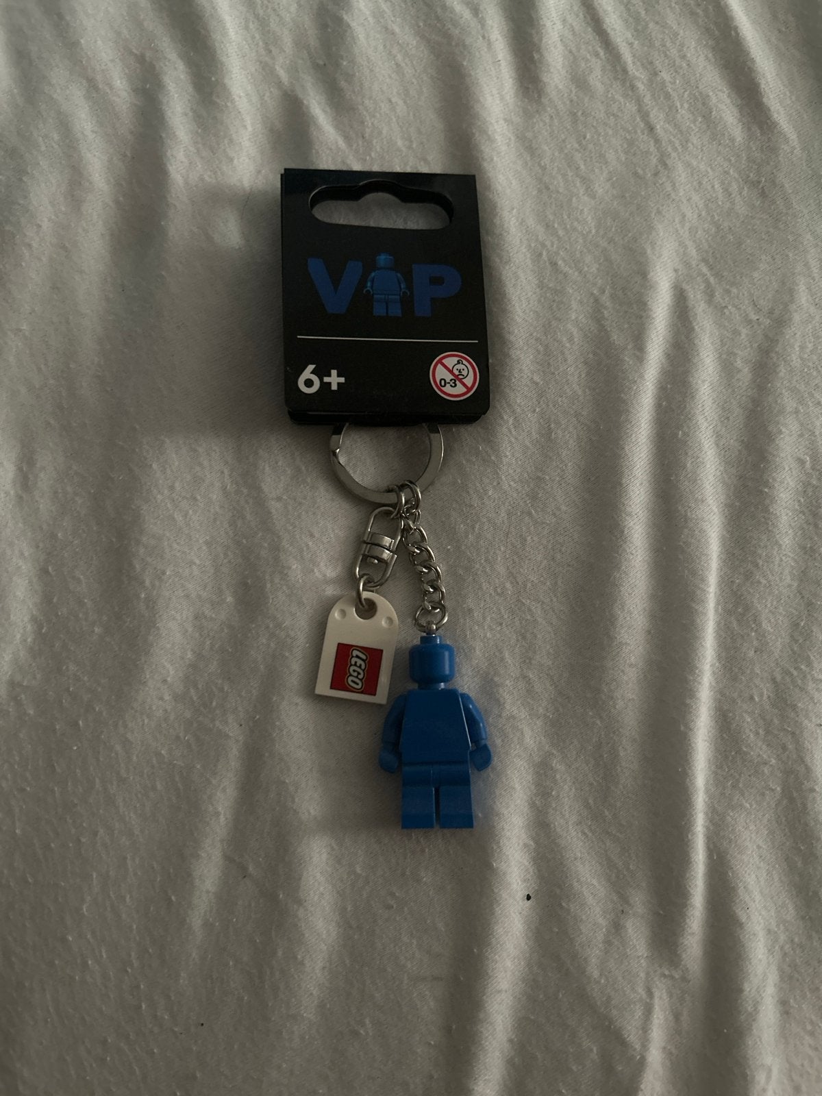 Lego VIP sleutelhanger blauw minifiguur nieuw, Lego, Nieuw, Ophalen of Verzenden, Sleutelhanger