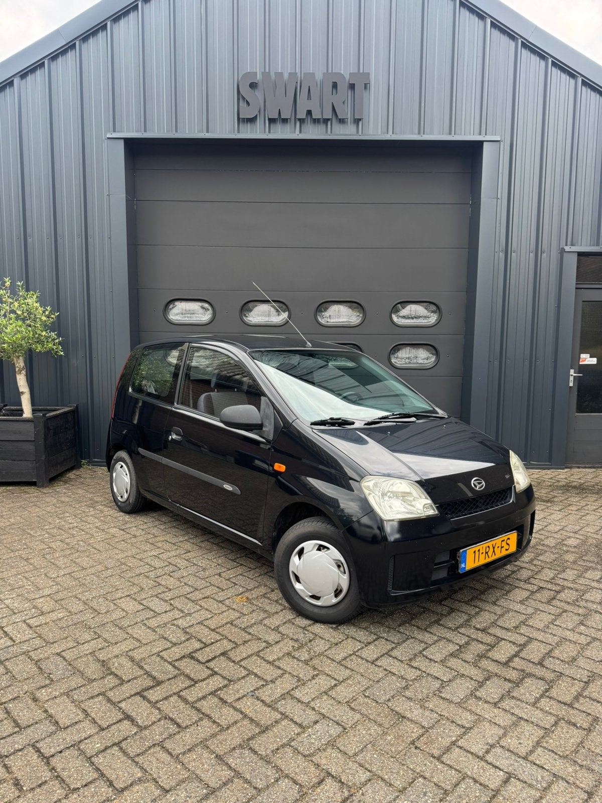 Daihatsu Cuore 1.0 Osaka 3D 2005 Zwart, Auto's, Daihatsu, Voorwielaandrijving, Stof, 600 kg, Zwart