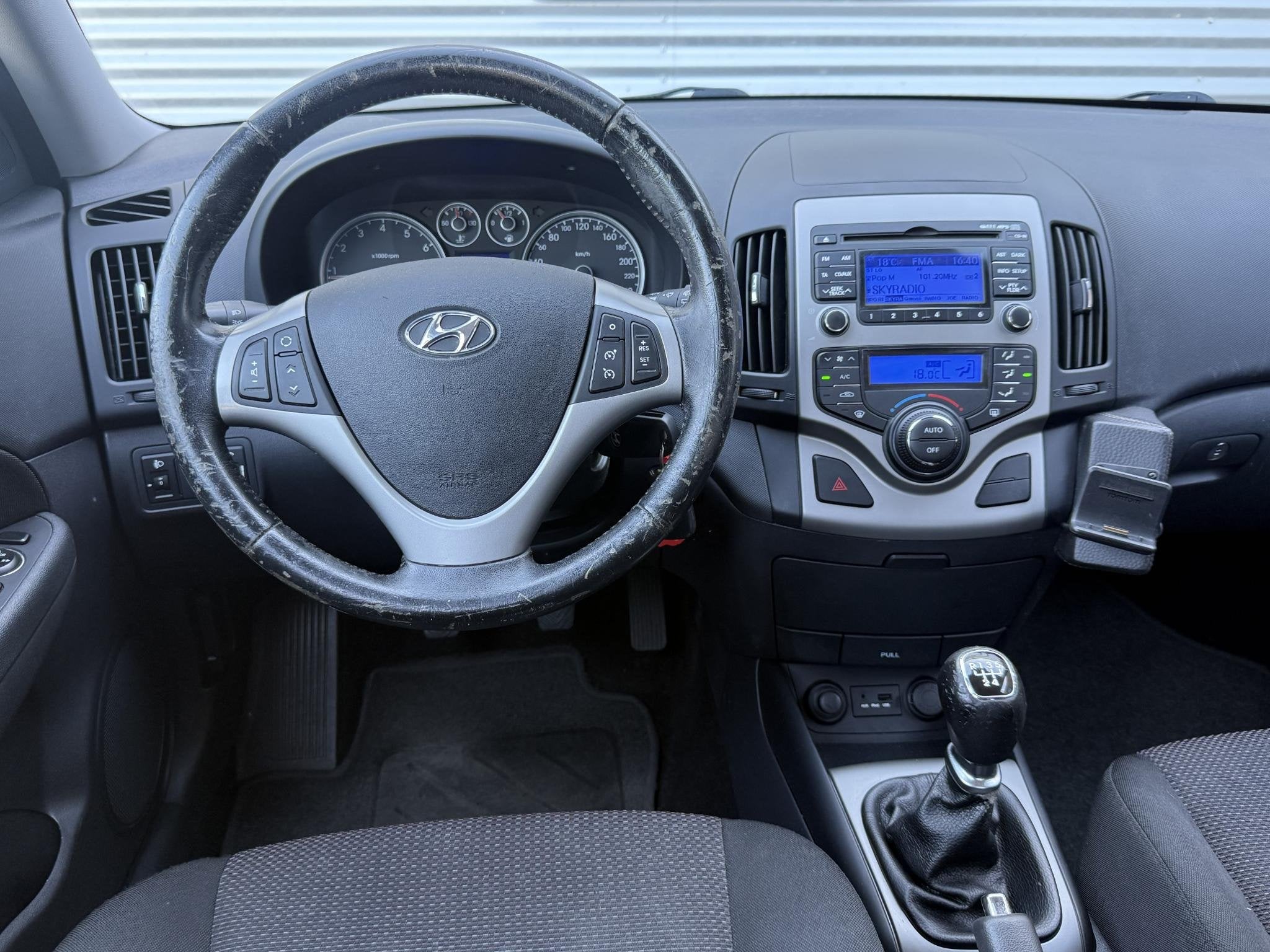 Hyundai i30 1.4i i-Motion 2e Eigenaar|Clima|Cruise|PDC|N.A.P, Auto's, Voorwielaandrijving, Euro 5, Stof, Gebruikt