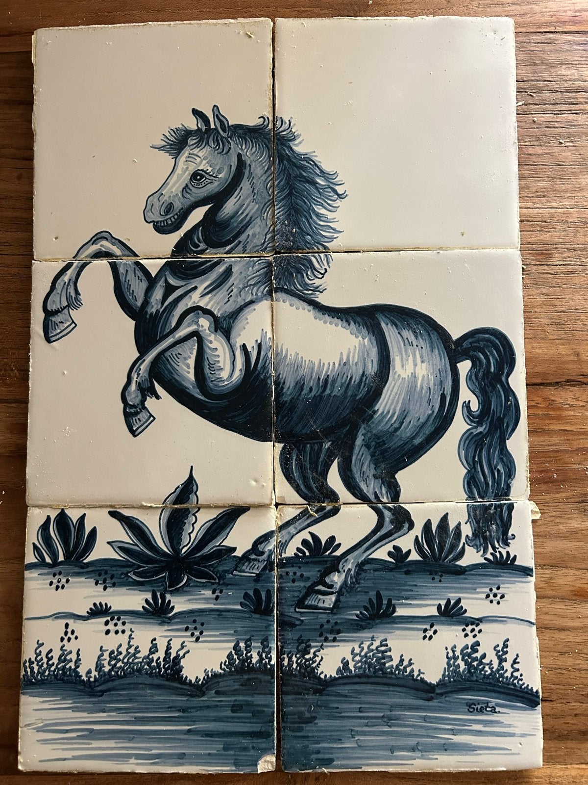 Delfts blauwe tegels met paard en konijnen, Ophalen
