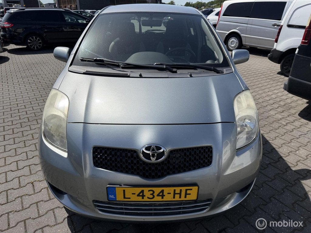Toyota Yaris 1.3 VVTi Executive erco, Auto's, Toyota, Stof, Zwart, 4 cilinders, 995 kg