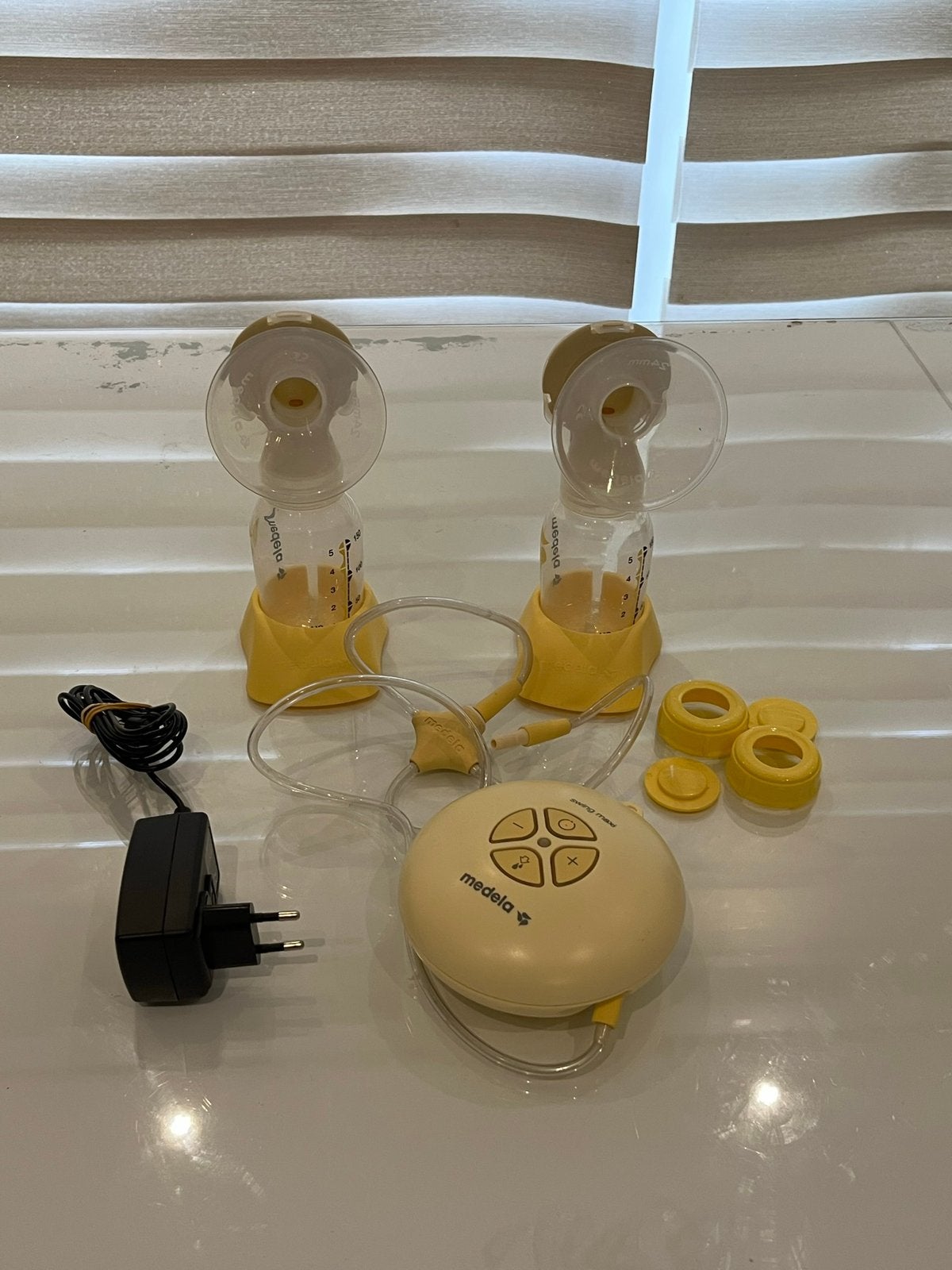 Medela kolf apparaat, Ophalen, Borstkolf