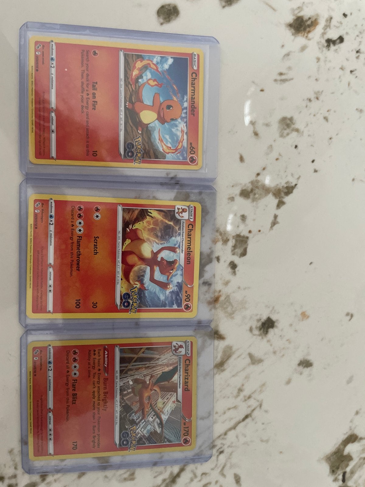 Pokémon Kaarten: Charmander, Charmeleon, Charizard Set, Ophalen, Zo goed als nieuw, Meerdere kaarten