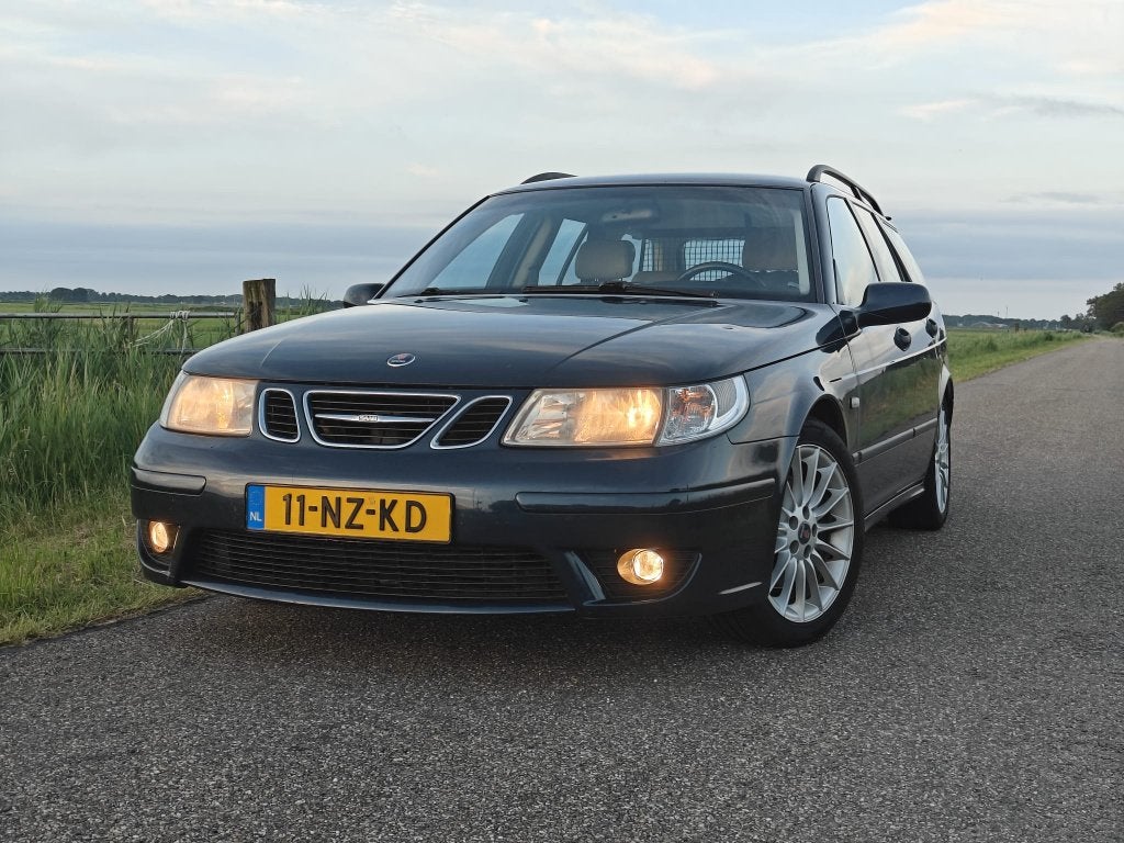 Saab 9-5 2.3 Turbo Aero Estate AUT 2004 Blauw, Auto's, Saab, 1800 kg, Beige, 4 cilinders, 2290 cc