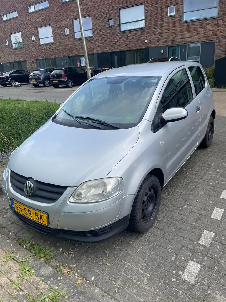 Volkswagen Fox 1.4 55KW 2006 Grijs, Voorwielaandrijving, 15 km/l, 4 cilinders, 4 stoelen