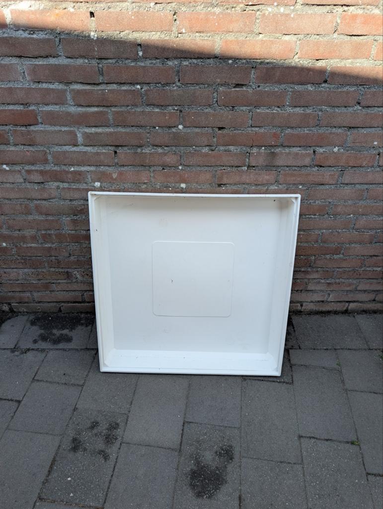 Wasmachine lekbak / opvangbak, Ophalen