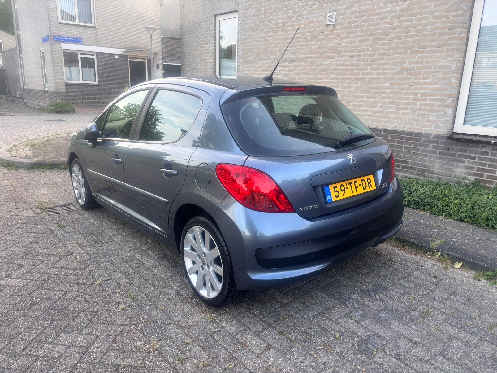 Peugeot 207 1.4 16V 5DRS 2006 Grijs, Auto's, Voorwielaandrijving, Stof, 1360 cc, Zwart