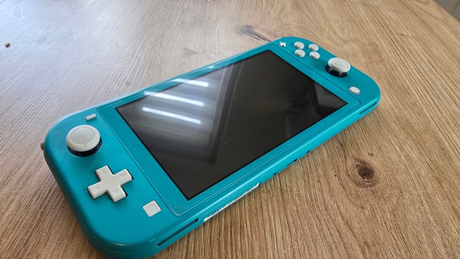Nintendo Switch Lite Turquoise + 32GB SD kaart, Ophalen, Turquoise, Gebruikt